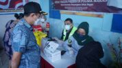 Camat Makassar Bersama Komunitas Bara 11 Gelar Vaksinasi Covid